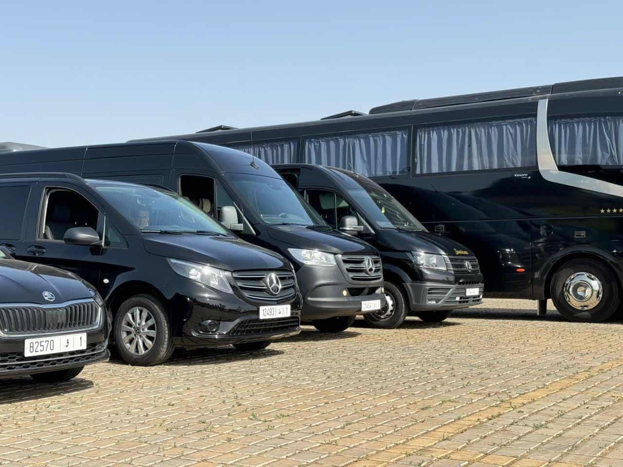 The Marassa Sky Tours fleet lined up: sedan, vans, minibuses and a touring coach